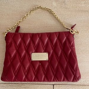 Used but like new Vintage red Valentino leather clutch